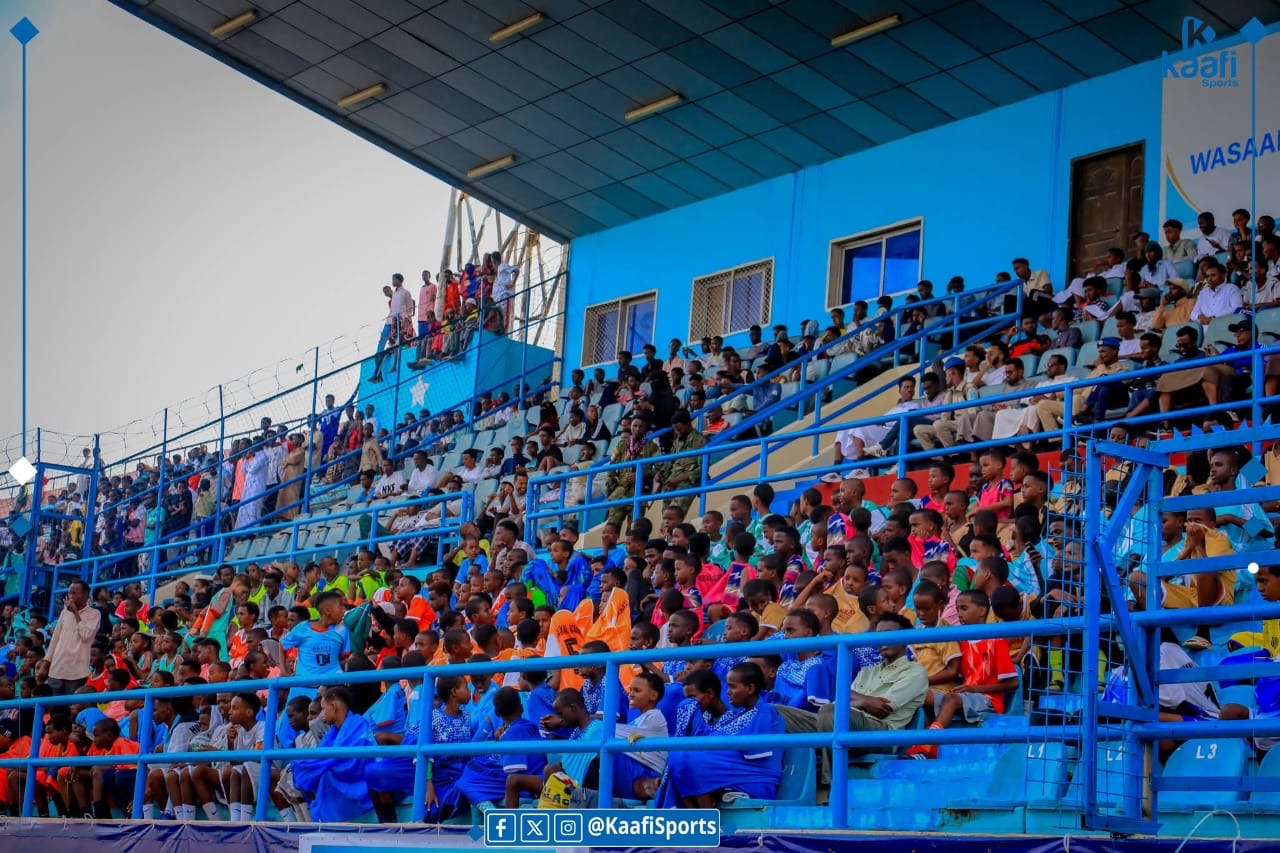 Community football event, packed stands